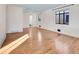 Hardwood floors and an open layout are featured in this living room at 1130 Locust St, Denver, CO 80220