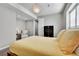 Basement bedroom with a queen bed, dresser, and window with shutters at 3946 Forever Cir, Castle Rock, CO 80109