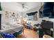 Cozy bedroom with a double bed, window, and wall-mounted TV at 2229 S Bannock St, Denver, CO 80223