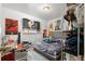 Bedroom with double bed, window, and various personal items at 2229 S Bannock St, Denver, CO 80223