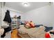 Bedroom with a double bed, ample closet space, and wood floors at 2229 S Bannock St, Denver, CO 80223