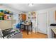 Kitchen with wood cabinets, gas range, and refrigerator at 2229 S Bannock St, Denver, CO 80223