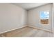 Bright bedroom with neutral walls and carpet flooring at 7318 Arkansas St, Frederick, CO 80530