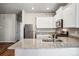 Kitchen boasts granite countertops and stainless steel appliances at 7318 Arkansas St, Frederick, CO 80530