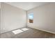 Bright bedroom with neutral walls and carpet flooring at 7318 Arkansas St, Frederick, CO 80530