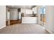 Bright living area with kitchen and access to backyard at 7318 Arkansas St, Frederick, CO 80530