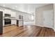 Modern kitchen featuring stainless steel appliances and an island at 7318 Arkansas St, Frederick, CO 80530