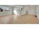 Bright living room featuring hardwood floors and an open floor plan at 2511 S Clarkson St, Denver, CO 80210