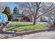 Ranch home with a spacious yard and mature trees at 5868 Routt St, Arvada, CO 80004