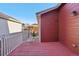 Red deck overlooks backyard, offering a peaceful view at 4444 N Meadows Dr, Castle Rock, CO 80109