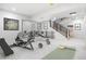 Basement home gym with weight equipment and yoga mat at 2524 Zenobia St, Denver, CO 80212