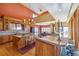 Gourmet kitchen with large island and custom cabinetry at 15958 Shadow Mountain Ranch Rd, Larkspur, CO 80118