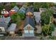 Aerial view of a house with a detached two car garage at 671 Elati St, Denver, CO 80204