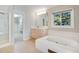 Elegant bathroom with soaking tub, walk-in shower, and ample vanity at 22141 Chippewa Ln, Golden, CO 80401