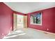Simple bedroom with a window offering wooded views at 22141 Chippewa Ln, Golden, CO 80401