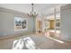 Bright dining room with hardwood floors and a chandelier at 22141 Chippewa Ln, Golden, CO 80401