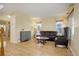 Living room with light wood floors and comfortable seating at 20109 E Doane Dr, Aurora, CO 80013