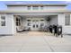 Covered patio with built-in seating and grill, perfect for outdoor entertaining at 16475 Essex S Rd, Platteville, CO 80651