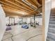 Unfinished basement with high ceilings, plumbing, and ample space for a home gym at 16475 Essex S Rd, Platteville, CO 80651