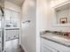 Simple bathroom with granite countertop and shower at 16475 Essex S Rd, Platteville, CO 80651