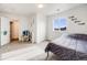 Spacious bedroom with a double bed, ample closet space, and a peaceful ambiance at 16475 Essex S Rd, Platteville, CO 80651