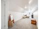 Versatile bonus room featuring a sectional sofa and plenty of space at 16475 Essex S Rd, Platteville, CO 80651