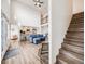 Two-story entry with hardwood floors and staircase at 16475 Essex S Rd, Platteville, CO 80651