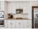 Kitchen with stainless steel appliances and granite countertops at 16475 Essex S Rd, Platteville, CO 80651
