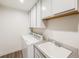 Convenient laundry room with washer, dryer, and utility sink at 16475 Essex S Rd, Platteville, CO 80651