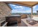 Private deck with hot tub and mountain views at 756 Dreamcatcher Ln, Evergreen, CO 80439