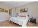 Spacious bedroom with wood floors and en-suite bathroom at 756 Dreamcatcher Ln, Evergreen, CO 80439