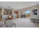 Spacious game room with wet bar, hot tub access, and mountain views at 756 Dreamcatcher Ln, Evergreen, CO 80439