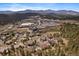 Wide aerial view of community and landscape at 756 Dreamcatcher Ln, Evergreen, CO 80439