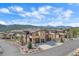 Aerial view of modern townhouses with mountain backdrop at 756 Dreamcatcher Ln, Evergreen, CO 80439