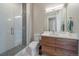 Modern bathroom with a walk-in shower and floating vanity at 756 Dreamcatcher Ln, Evergreen, CO 80439