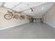 Finished garage with epoxy flooring and bike storage at 756 Dreamcatcher Ln, Evergreen, CO 80439