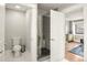 Modern bathroom with a glass shower and hexagon tile floor at 507 S Emerson St, Denver, CO 80209