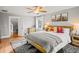 Spacious main bedroom with wood flooring and a large bed at 507 S Emerson St, Denver, CO 80209