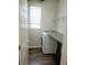 Laundry room with washer, dryer, and countertop at 24728 E Arizona Cir, Aurora, CO 80018