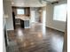 Open concept kitchen with a large island and breakfast area at 24728 E Arizona Cir, Aurora, CO 80018