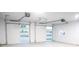 Spacious two-car garage with automatic openers and windows at 14405 County Road 12, Fort Lupton, CO 80621