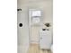 Simple bathroom with a shower and a pedestal sink at 14405 County Road 12, Fort Lupton, CO 80621