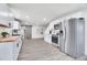 Modern kitchen with stainless steel appliances and light wood countertops at 14405 County Road 12, Fort Lupton, CO 80621
