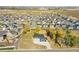 Property view showing house and surrounding neighborhood at 14405 County Road 12, Fort Lupton, CO 80621