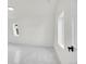 Small bedroom with carpet, window and door at 14405 County Road 12, Fort Lupton, CO 80621