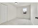 Simple bedroom with a window and a closet at 14405 County Road 12, Fort Lupton, CO 80621