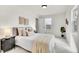 Bright bedroom with a queen-size bed and ample closet space at 14405 County Road 12, Fort Lupton, CO 80621