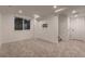 Finished basement room with neutral wall paint, carpet, and a window at 8665 Middle Fork St, Littleton, CO 80125