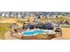 Community pool and clubhouse aerial view at 39286 Hart Cir, Elizabeth, CO 80107