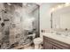 Basement bathroom with a large walk-in shower and gray tile at 1451 S Josephine St, Denver, CO 80210